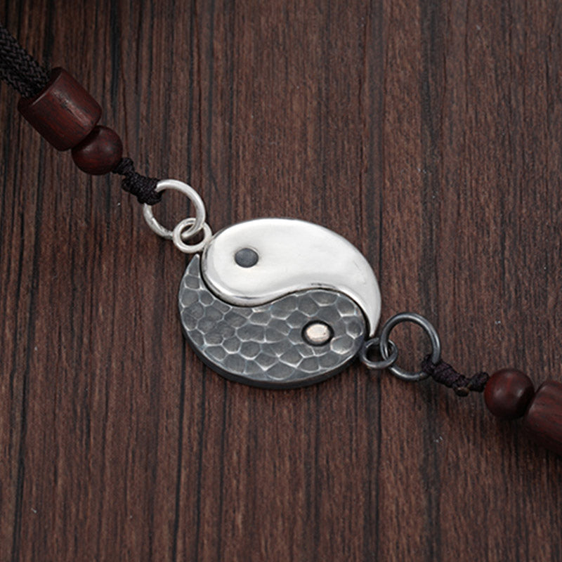 Sterling Silver Yin Yang Pendant - Hammered silver and oxidized yin-yang on black cord with wooden beads, yin yang bracelet