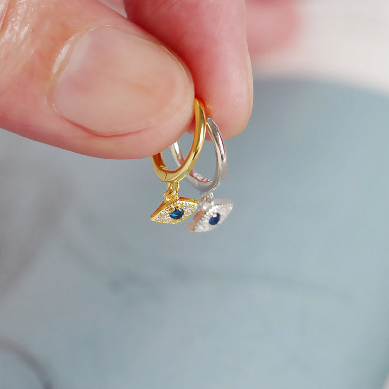 Evil Eye Dangle Huggie Earrings Held in Hand Silver Gold Tone, Protective Talisman Jewelry