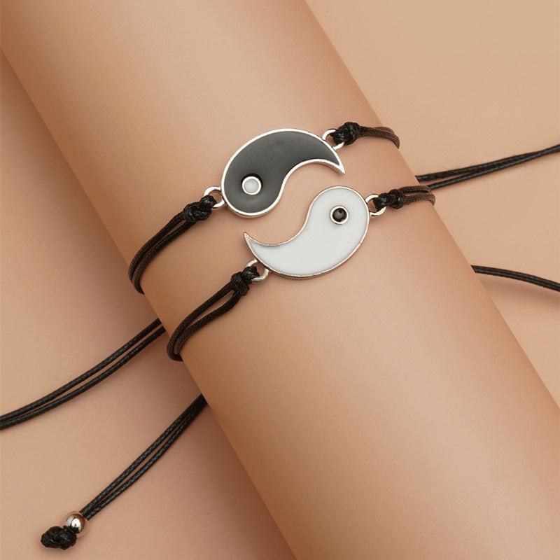 Yin Yang Hematite Bracelet - Black & white charms worn together on single wrist, adjustable fit