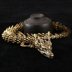 Brass Copper Dragon Statue – held in hand showing scale and poseable segmented body, Desk decor