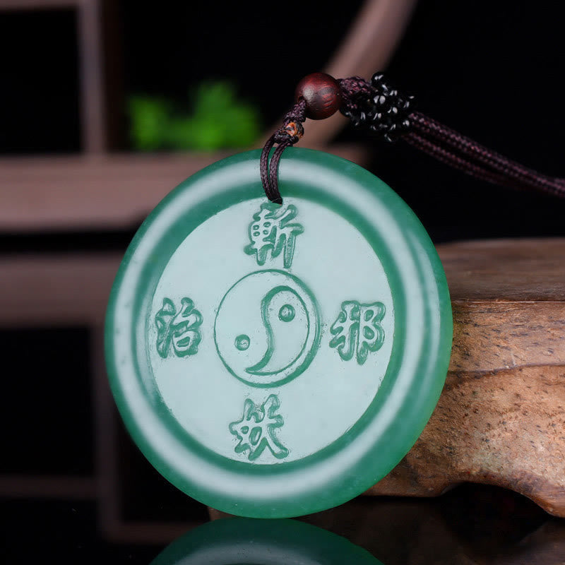 Green Aventurine Yin Yang Balance Necklace Pendant – carved yin-yang disc on dark cord, green aventurine Main image
