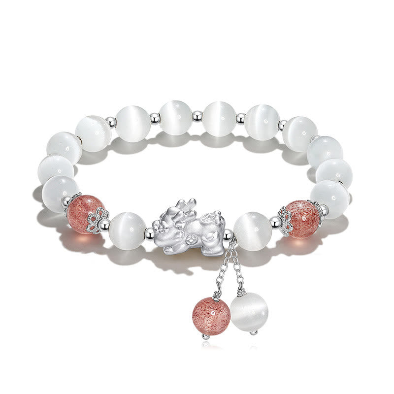 Cat's Eye PiXiu Bracelet – White background flat lay with strawberry quartz and cat's eye beads