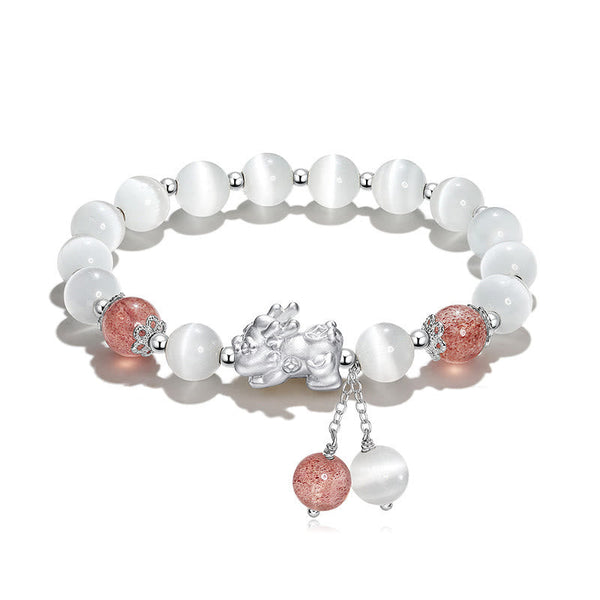 Cat's Eye PiXiu Bracelet – White background flat lay with strawberry quartz and cat's eye beads