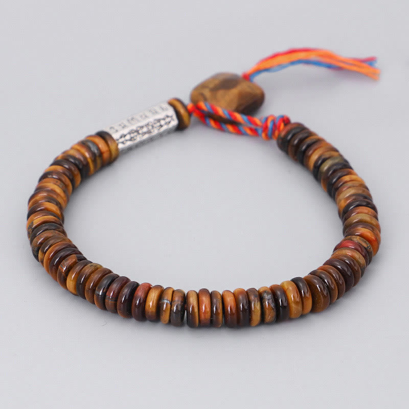 Tiger Eye Om Mani Padme Hum Bracelet - full view on gray background, tiger eye beads Hauptbild