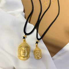 Gold Buddha Copper Wealth Necklace Pendant – Polished copper Buddha figure with golden finish, wealth talisman necklace