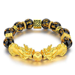 Double Pixiu Obsidian Bracelet – two gold Pixiu charms with mantra beads on white background, feng shui jewelry