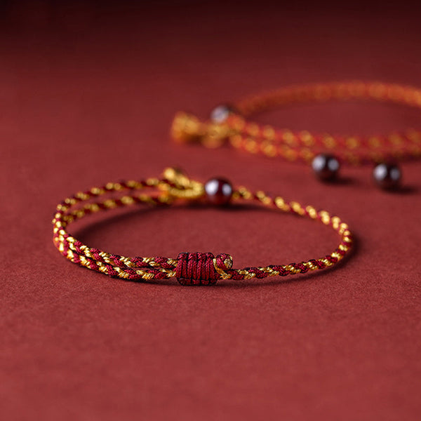 Red Gold Rope Lotus Braid Bracelet - stacked pair highlighting gold thread texture, braid bracelet