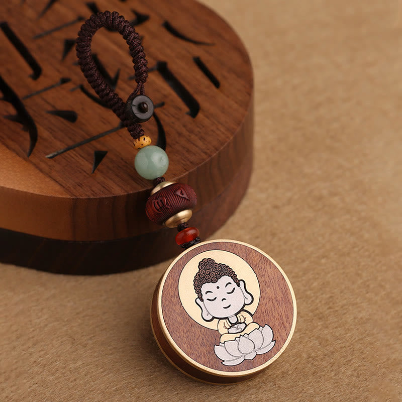Ebony Avalokitesvara Keychain – in hand with car steering wheel background, driving protection amulet