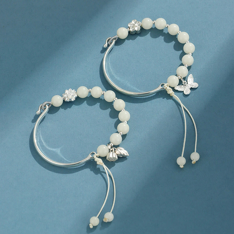 Bodhi Seed Butterfly Lotus Bracelet – Flat lay with incense, bodhi prayer bead bracelet