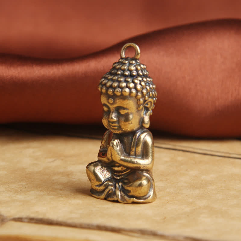 Copper Keychain Pendant – close-up Buddha face, spiritual charm
