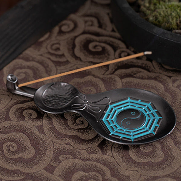 Gourd Yin Yang Bagua Incense Burner – Black gourd with cyan Bagua on cloud fabric with moss accent, copper burner