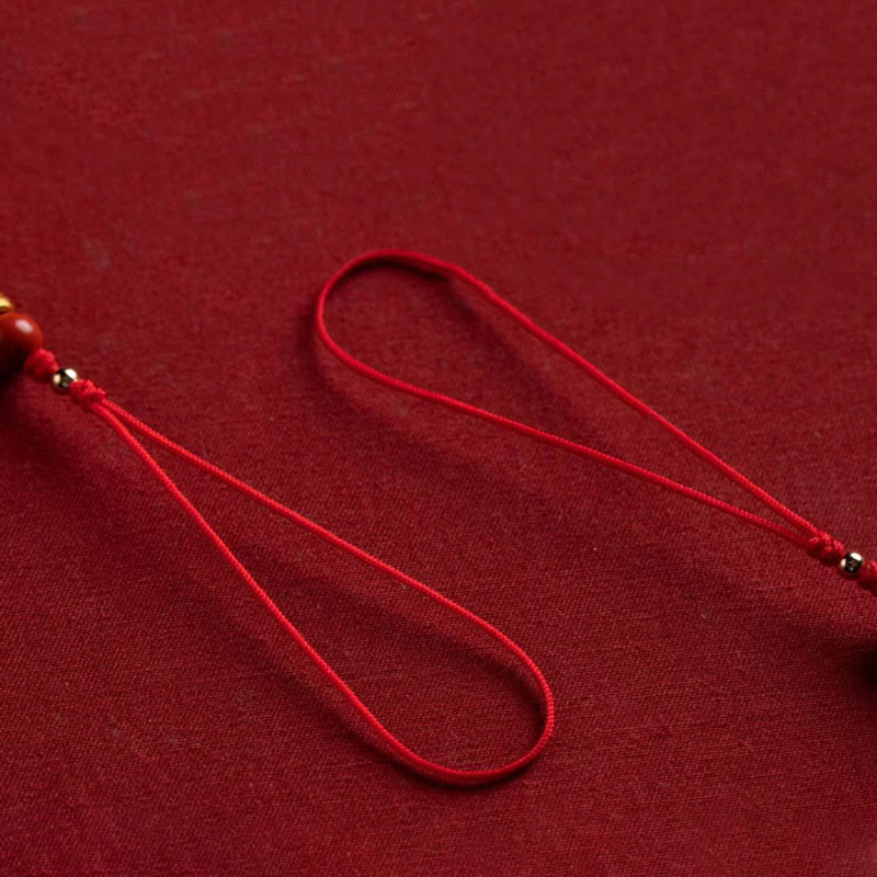 Koi Fish Cinnabar Ruyi Phone Charm – complete phone charm with cinnabar koi, ruyi, beads, and cord, wealth decor