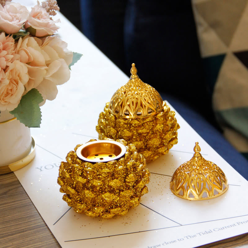 Gold Pine Cone Mini Incense Burner - Paired burners assembled and open, pink flowers, meditation decor