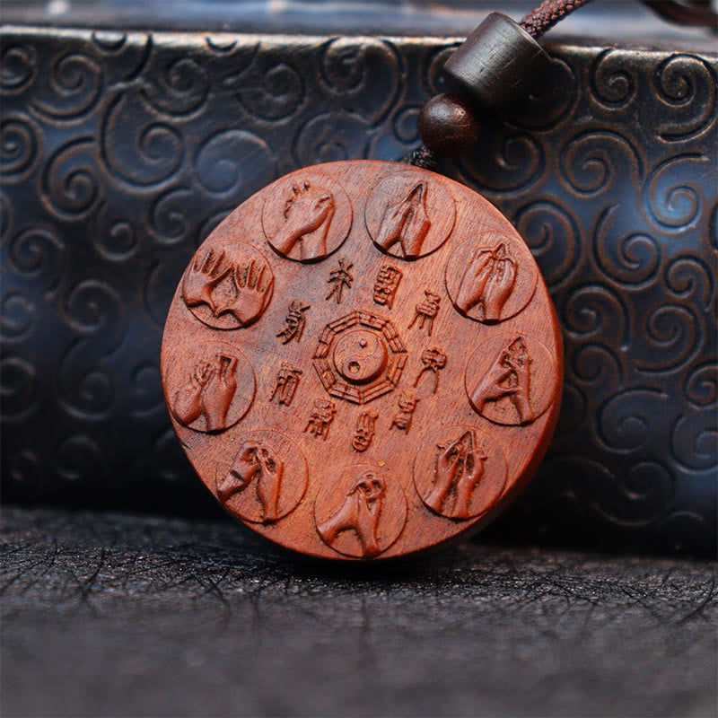 Lightning Struck Jujube Wood Pendant – Circular wooden disc with carved bagua yin-yang center, eight mudra hand gestures and 