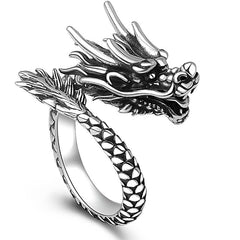 Sterling Silver Dragon Ring - three-quarter view of detailed dragon head with open jaw and fangs, bold statement