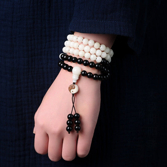 Ebony Yin Yang Protection Mala - yin yang mala worn on wrist with guru bead, meditation bracelet