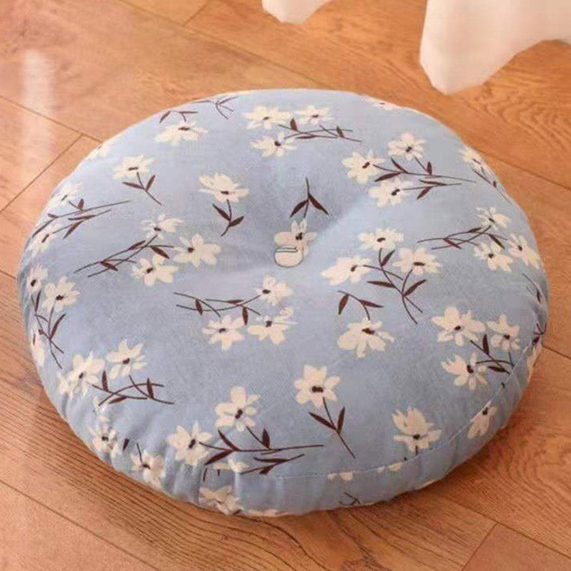 Lotus Linen Meditation Cushion – Powder blue floral stems on wood floor, gentle pattern