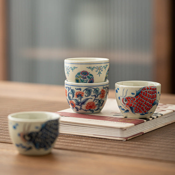 Koi Fish Sunflower Cup – angled top-down showing arowana and sunflower, teaware