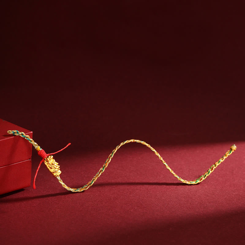 Colorful Dragon Carved Braided Bracelet – Gold charm focal point on colorful braid with red box, Festive