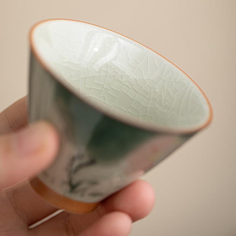 Persimmon Boat Teacup – detail of lotus flower decoration, glazed ceramic cup