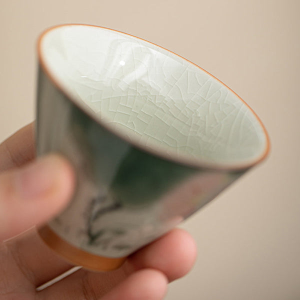 Persimmon Boat Teacup – detail of lotus flower decoration, glazed ceramic cup