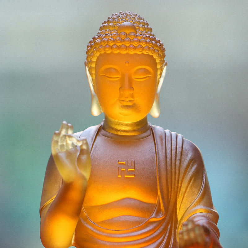 Sakyamuni Buddha Liuli Crystal Statue – Warm amber glow emanating from within, home office decor