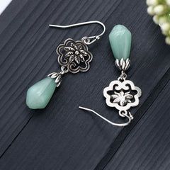 Magnolia Flower Jade Prosperity Dangle Earrings, side view, earring jewelry
