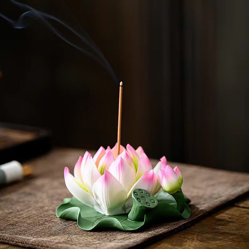 Lotus Ceramic Incense Burner - pink lotus bloom with seed pod on green leaf, smoke rising, ceramic incense holder