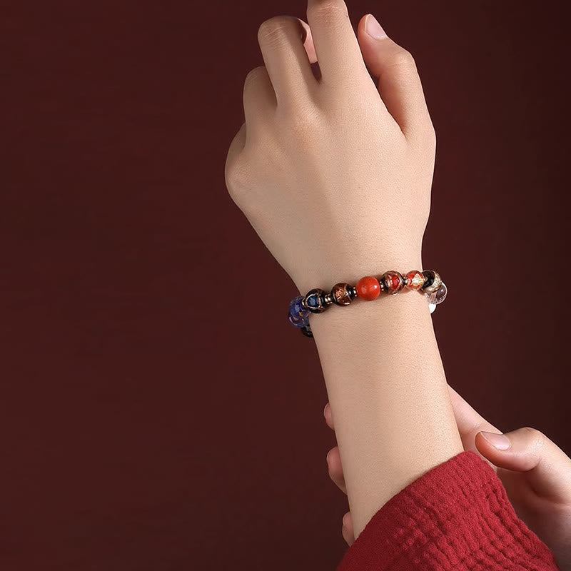 Tibetan Liuli Wrist Mala – Liuli glass bead bracelet worn on wrist, colorful gemstone detail shot