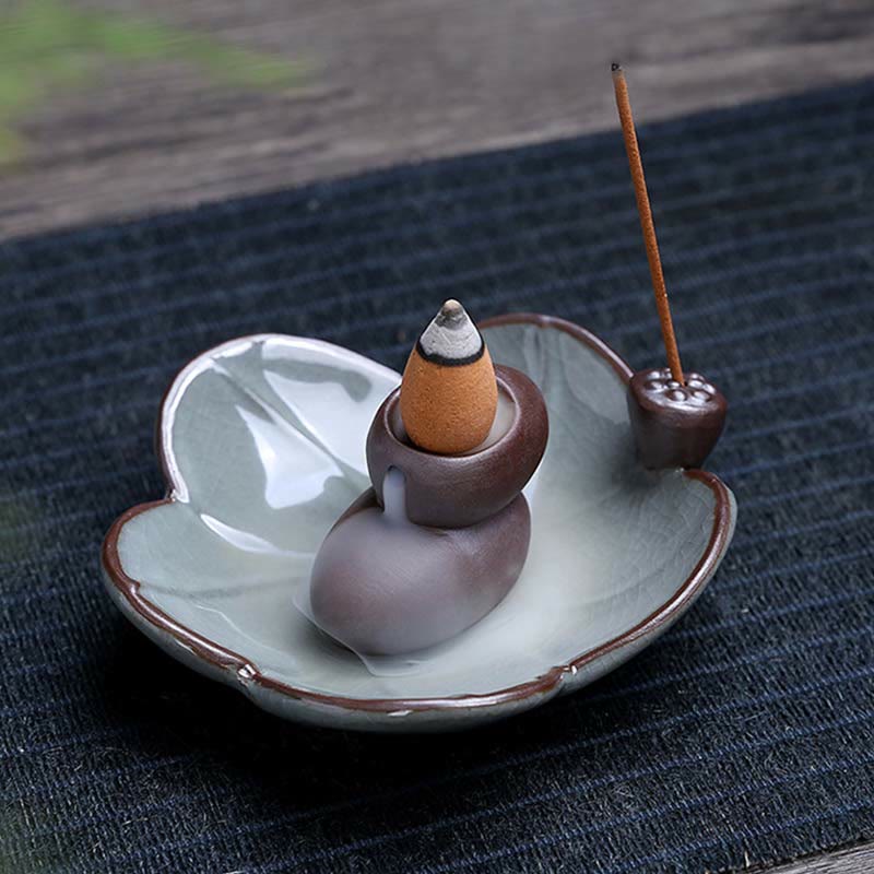 Lotus Ceramic Backflow Incense Burner - sculptural animal holder on lotus dish with paw print stick rest