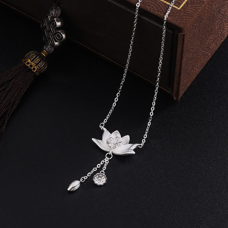 999 Silver Lotus Pod Necklace – Lotus with dangling charms on black velvet, tassel and gift box, silver necklace