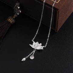 999 Silver Lotus Pod Necklace – Lotus with dangling charms on black velvet, tassel and gift box, silver necklace