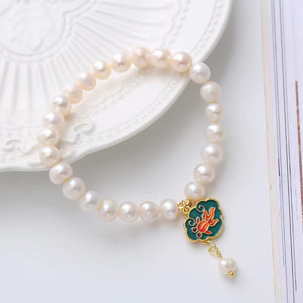 Pearl Lotus Koi Bracelet – Clasp and string detail, adjustable pearl charm bracelet