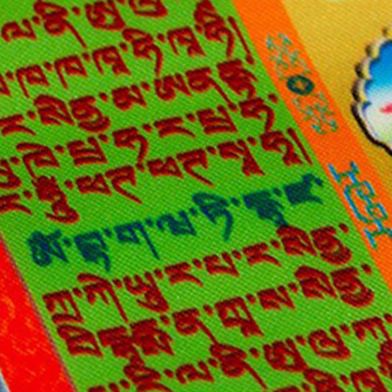 Tibetan Windhorse 10-Color Prayer Flag – scale comparison with hand, compact desktop Buddha statue