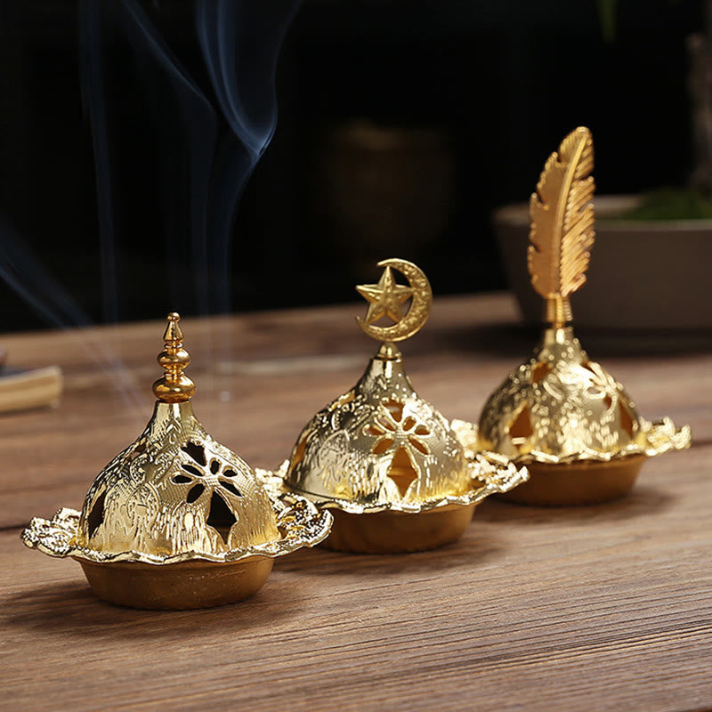 Mini Alloy Incense Burner – gold burner trio with interchangeable finials, smoke curling upward