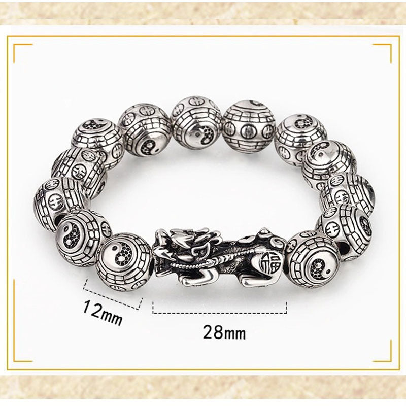 Tibetan Feng Shui PiXiu Silver Bracelet – White background flat lay showing 12mm Bagua beads with 28mm Pixiu centerpiece and coin symbols