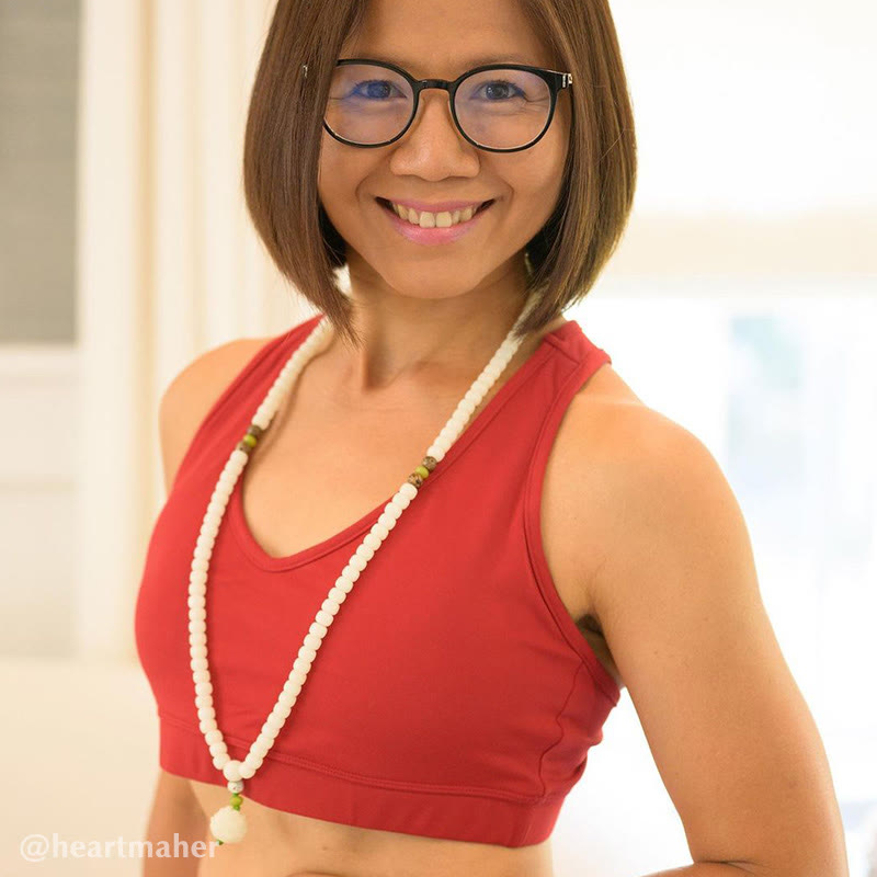 Bodhi Seed Lotus Mala - long necklace on model in red top, white cream bodhi beads, everyday spiritual