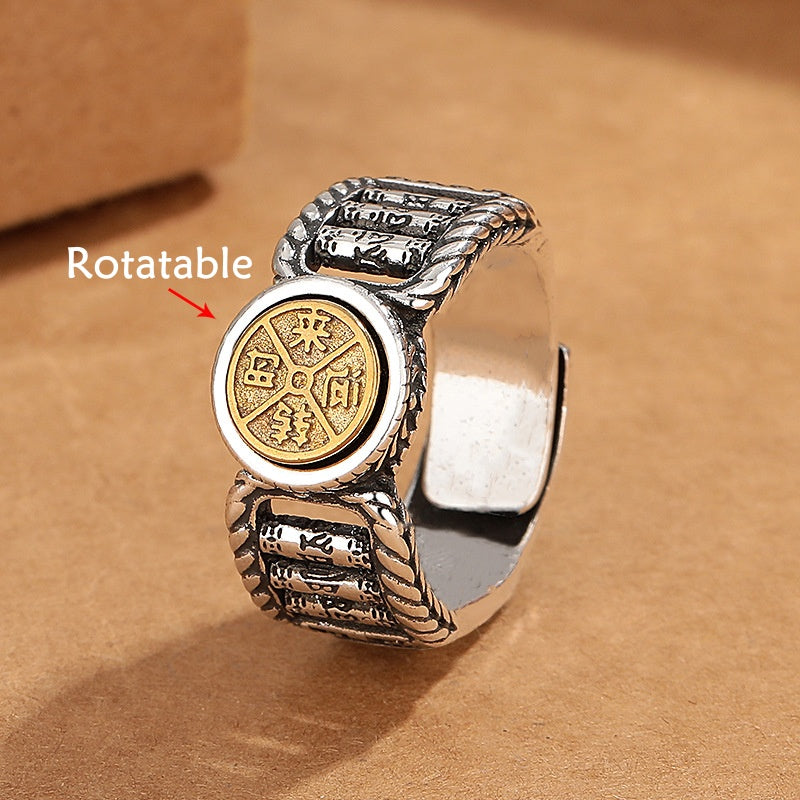 Om Mani Padme Hum Copper Ring – Rotatable gold coin center on dark wood, rotatable ring Main image