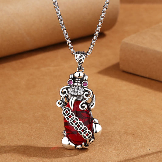 Garnet PiXiu Necklace – Silver PiXiu pendant with deep red garnet body on silver chain, passion jewelry
