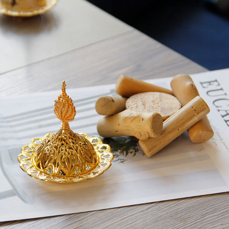 Gold Alloy Mini Incense Burner – ornate dome lid with sandalwood sticks on eucalyptus print paper, gold incense accessories