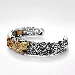 Koi Fish Prosperity Bangle - close-up of koi fish scales and fin carvings, fortune bracelet