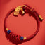 Koi Fish Bracelet – Front view of braided silver bracelet with koi charm, sterling silver jewelry
