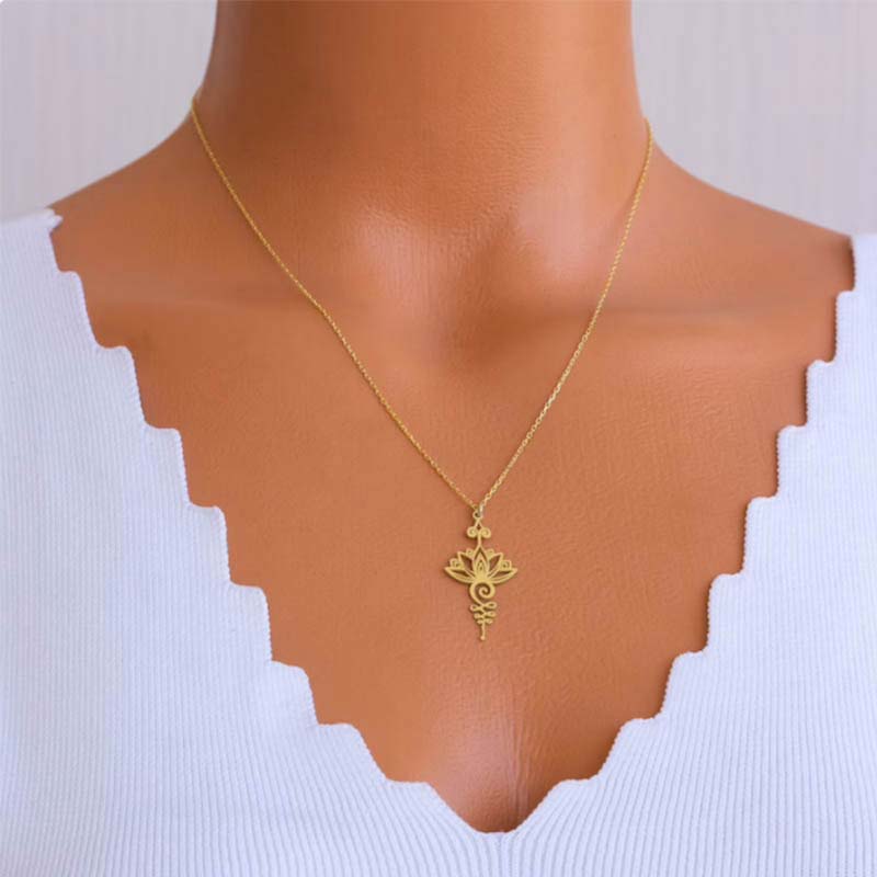 Lotus Luck Wealth Titanium Necklace – gold lotus necklace worn on mannequin at collarbone, titanium