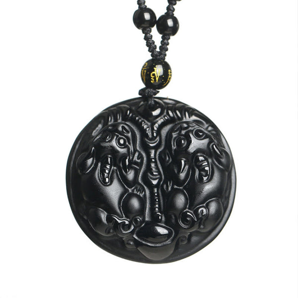Double PiXiu Necklace – Isolated black obsidian double PiXiu disc pendant on white, purification talisman