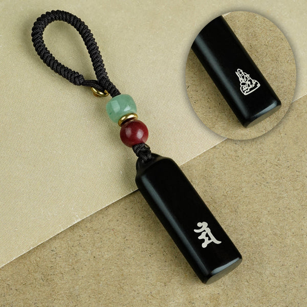 Ebony Eight Guardians talisman keychain with silver inlay for Dog and Pig zodiac Buddhist protection