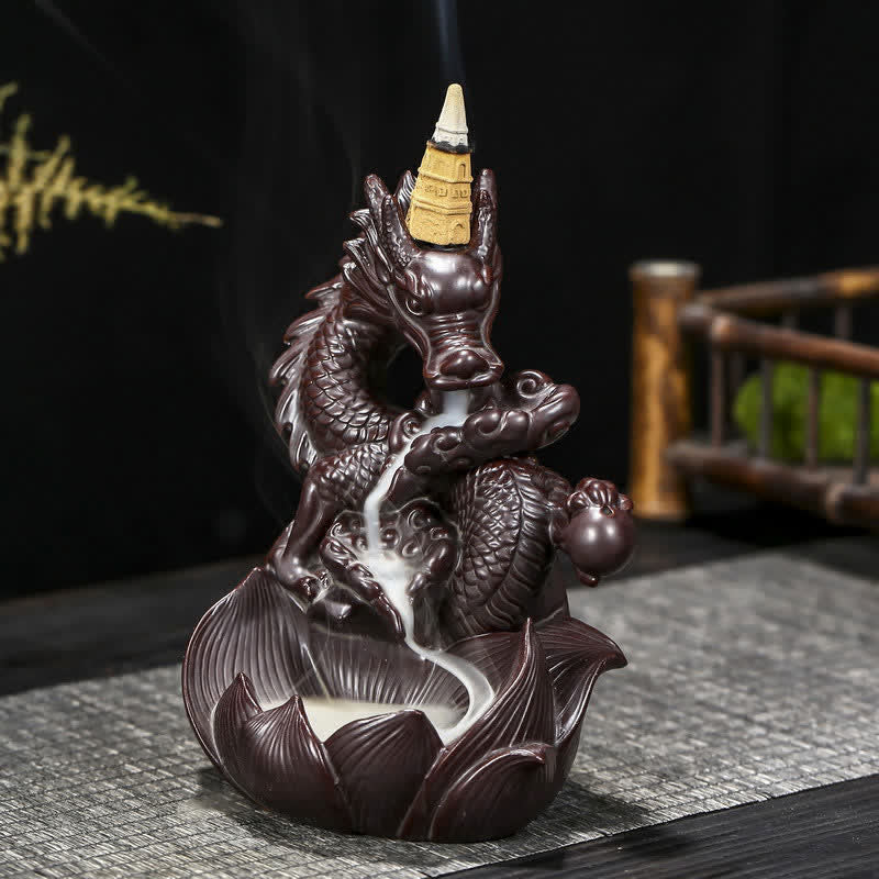Dragon Lotus Ceramic Incense Burner – Front view of dragon holding pearl with smoke flowing through body channel, Meditative