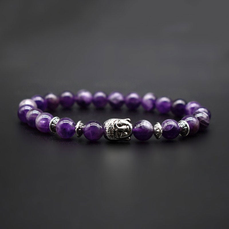 Amethyst Buddha Bracelet – Studio shot on dark gray background showing purple bead texture, meditation