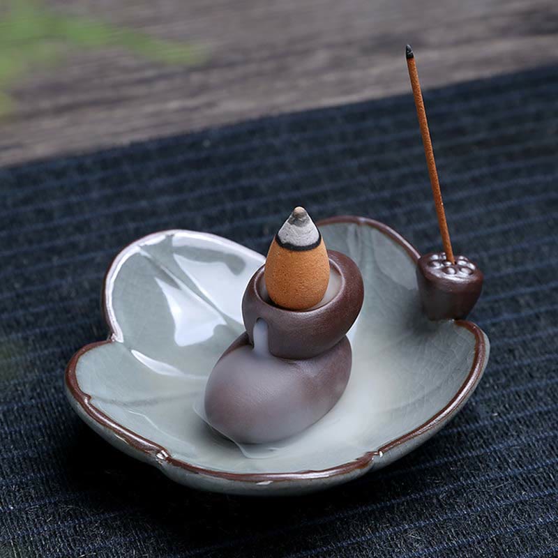 Lotus Ceramic Backflow Incense Burner - snail holder on lotus leaf dish with backflow cone, natural setting