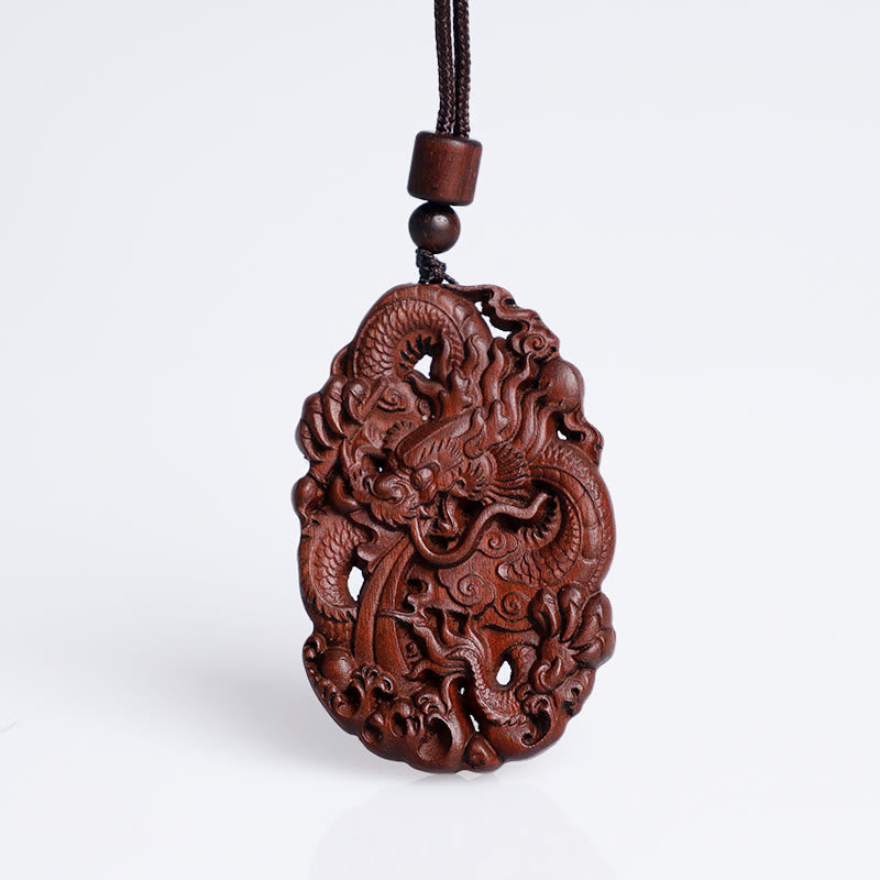 Lightning Jujube Wood Dragon Pendant - Suspended on white background showing full dragon, Luck