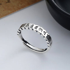 925 Sterling Silver Om Mani Padme Hum Ring – sterling silver mantra ring with S925 stamp, angled top view, Buddhist jewelry